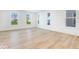Spacious living room with hardwood floors and large windows at 5751 Cr W 750 N, McCordsville, IN 46055
