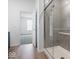 Modern bathroom with a walk-in shower and access to bedroom at 5755 Cr W 750 N, McCordsville, IN 46055