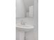 Simple pedestal sink and vanity in a small bathroom at 5755 Cr W 750 N, McCordsville, IN 46055