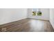 Spacious bedroom with hardwood floors and large windows at 5755 Cr W 750 N, McCordsville, IN 46055