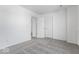 Bright bedroom with gray carpeting and two closets at 5755 Cr W 750 N, McCordsville, IN 46055