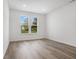Bright bedroom with hardwood floors and large windows at 5755 Cr W 750 N, McCordsville, IN 46055