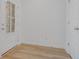 Bright entryway with light hardwood floors and white walls at 5755 Cr W 750 N, McCordsville, IN 46055