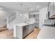Modern kitchen with gray cabinets and an island at 5763 Cr W 750 N, McCordsville, IN 46055