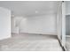 Spacious living room with carpeted floors and access to deck at 5763 Cr W 750 N, McCordsville, IN 46055