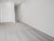 Bright loft space featuring neutral carpeting and double doors at 5763 Cr W 750 N, McCordsville, IN 46055