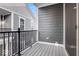 Private balcony with composite decking and metal railings at 5767 Cr W 750 N, McCordsville, IN 46055