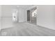 Bright bedroom with grey carpet, access to balcony, and ample closet space at 5767 Cr W 750 N, McCordsville, IN 46055