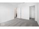 Well-lit bedroom with grey carpet, a private bathroom, and a walk-in closet at 5767 Cr W 750 N, McCordsville, IN 46055