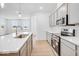 Modern kitchen features stainless steel appliances and an island at 5767 Cr W 750 N, McCordsville, IN 46055