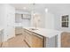 Kitchen island with white countertop and stainless steel dishwasher at 5767 Cr W 750 N, McCordsville, IN 46055