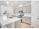 Modern kitchen with gray cabinets and stainless steel appliances at 5767 Cr W 750 N, McCordsville, IN 46055