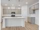 Modern kitchen with gray cabinets, white countertops and island at 5767 Cr W 750 N, McCordsville, IN 46055