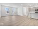 Open concept living room with hardwood floors and kitchen at 5767 Cr W 750 N, McCordsville, IN 46055