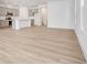 Living room with hardwood floors and kitchen island view at 5767 Cr W 750 N, McCordsville, IN 46055