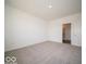 Spacious bedroom with carpeted floors, a closet, and access to the ensuite bathroom at 6033 Granby Dr, Whitestown, IN 46075