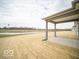 View of back patio, pond and yard at 6047 Granby Dr, Whitestown, IN 46075