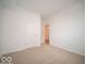 Spacious bedroom with neutral carpet and a view into the hallway at 6047 Granby Dr, Whitestown, IN 46075