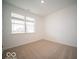 Neutral bedroom with a large window and a neutral carpet at 6047 Granby Dr, Whitestown, IN 46075
