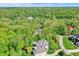 A stately home with mature trees and landscaping at 8602 Frontgate Ln, Indianapolis, IN 46256