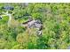 An estate home with a pool and surrounding mature trees at 8602 Frontgate Ln, Indianapolis, IN 46256