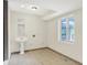 Classic style powder room with pedestal sink and tile floors at 8602 Frontgate Ln, Indianapolis, IN 46256