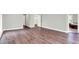 Bedroom featuring hardwood floors, neutral walls, and door to bath and closet at 8602 Frontgate Ln, Indianapolis, IN 46256