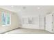 Large bedroom with built-in shelving and a window with backyard views at 8602 Frontgate Ln, Indianapolis, IN 46256