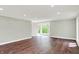 A bright and airy bedroom with a large bay window with views of the outside at 8602 Frontgate Ln, Indianapolis, IN 46256