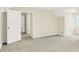 Spacious bedroom with neutral carpet and multiple doorways for flexible use at 8602 Frontgate Ln, Indianapolis, IN 46256