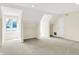 Large bonus room featuring neutral carpet, recessed lights, and large windows at 8602 Frontgate Ln, Indianapolis, IN 46256