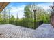 This lovely deck area overlooks a serene wooded area and has a custom tiled deck surface at 8602 Frontgate Ln, Indianapolis, IN 46256