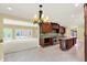 Open-concept kitchen with stainless steel appliances, island, and easy access to the living area at 8602 Frontgate Ln, Indianapolis, IN 46256