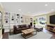 Inviting living room with built-in bookshelves and a large bay window at 8602 Frontgate Ln, Indianapolis, IN 46256