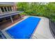 This stunning home features a pool with an automatic cover in a luxurious backyard setting at 8602 Frontgate Ln, Indianapolis, IN 46256