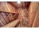 Home sauna features wood paneling and a bench for relaxing after a workout at 8602 Frontgate Ln, Indianapolis, IN 46256