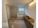 Bathroom featuring a tub, tile shower, and modern vanity at 9497 Dogwood Dr, McCordsville, IN 46055