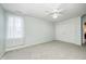 Light and airy bedroom with a ceiling fan at 10144 Watkins Ct, Indianapolis, IN 46234