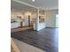 Spacious kitchen with white cabinets, granite countertops and stainless steel appliances at 1078 Tomahawk Pl, Martinsville, IN 46151