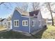 Newly painted blue home with a spacious yard at 1103 W 5Th St, Anderson, IN 46016