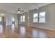 Spacious living room featuring hardwood floors and an open floor plan at 1103 W 5Th St, Anderson, IN 46016