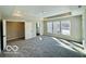 Main bedroom with carpet and walk-in closet at 1644 Hunting Horn Cir, Indianapolis, IN 46260