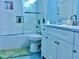 Updated bathroom featuring a walk-in shower and modern vanity at 1842 Queensbridge Dr, Indianapolis, IN 46219