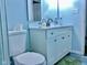 Clean bathroom with white vanity, a bathtub and shower at 1842 Queensbridge Dr, Indianapolis, IN 46219