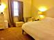 Bedroom with a queen bed and plenty of space at 1842 Queensbridge Dr, Indianapolis, IN 46219