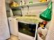Laundry room with washer, dryer, and shelving at 1842 Queensbridge Dr, Indianapolis, IN 46219
