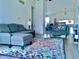 Spacious living room with gray sectional sofa and rug at 1842 Queensbridge Dr, Indianapolis, IN 46219
