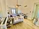 Bright living room with vaulted ceilings and hardwood floors at 1842 Queensbridge Dr, Indianapolis, IN 46219