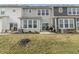 Townhome backyard with small patio, grill, and lawn at 18655 Moray St, Westfield, IN 46069