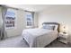 Bedroom with a comfortable bed and a window with neighborhood view at 18655 Moray St, Westfield, IN 46069